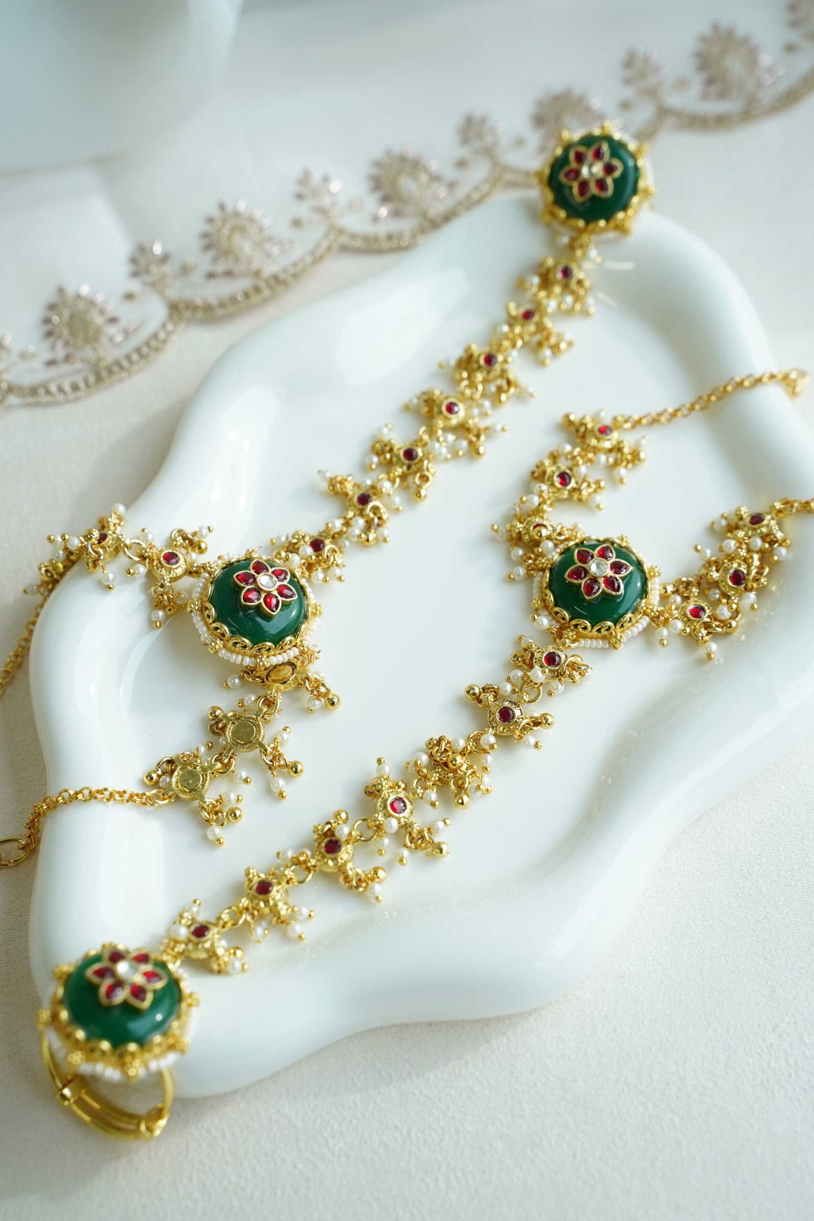 Seyora Jewels traditional hathphool hand chain featuring an adjustable finger ring and connecting chain in a bright gold-plated heritage finish.