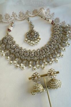 Tanya champagne stone necklace set with pearl beads and matching jhumka earrings and tikka - South Asian bridal jewelry