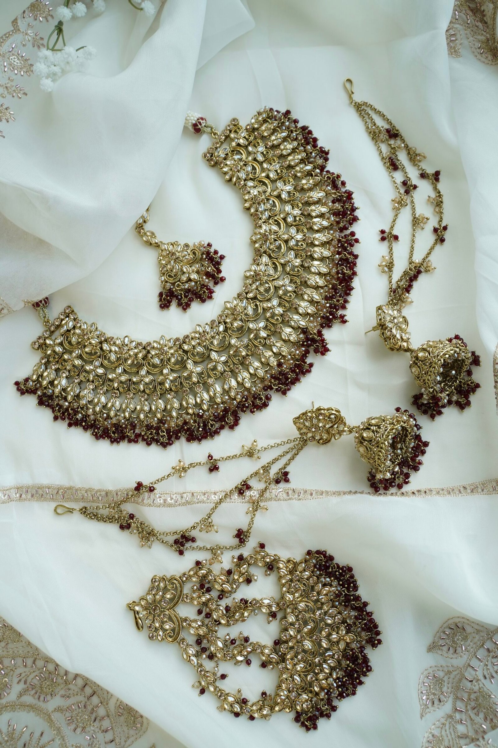 Champagne and maroon beaded bridal set with jhumka earrings, kanchain, tikka, and passa - South Asian wedding jewelry