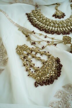 Champagne and maroon beaded bridal set with jhumka earrings, kanchain, tikka, and passa - South Asian wedding jewelry