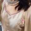 Sparkly flexible zircon necklace featuring flower shaped flower petal drop earrings and a matching pearl-beaded tikka.