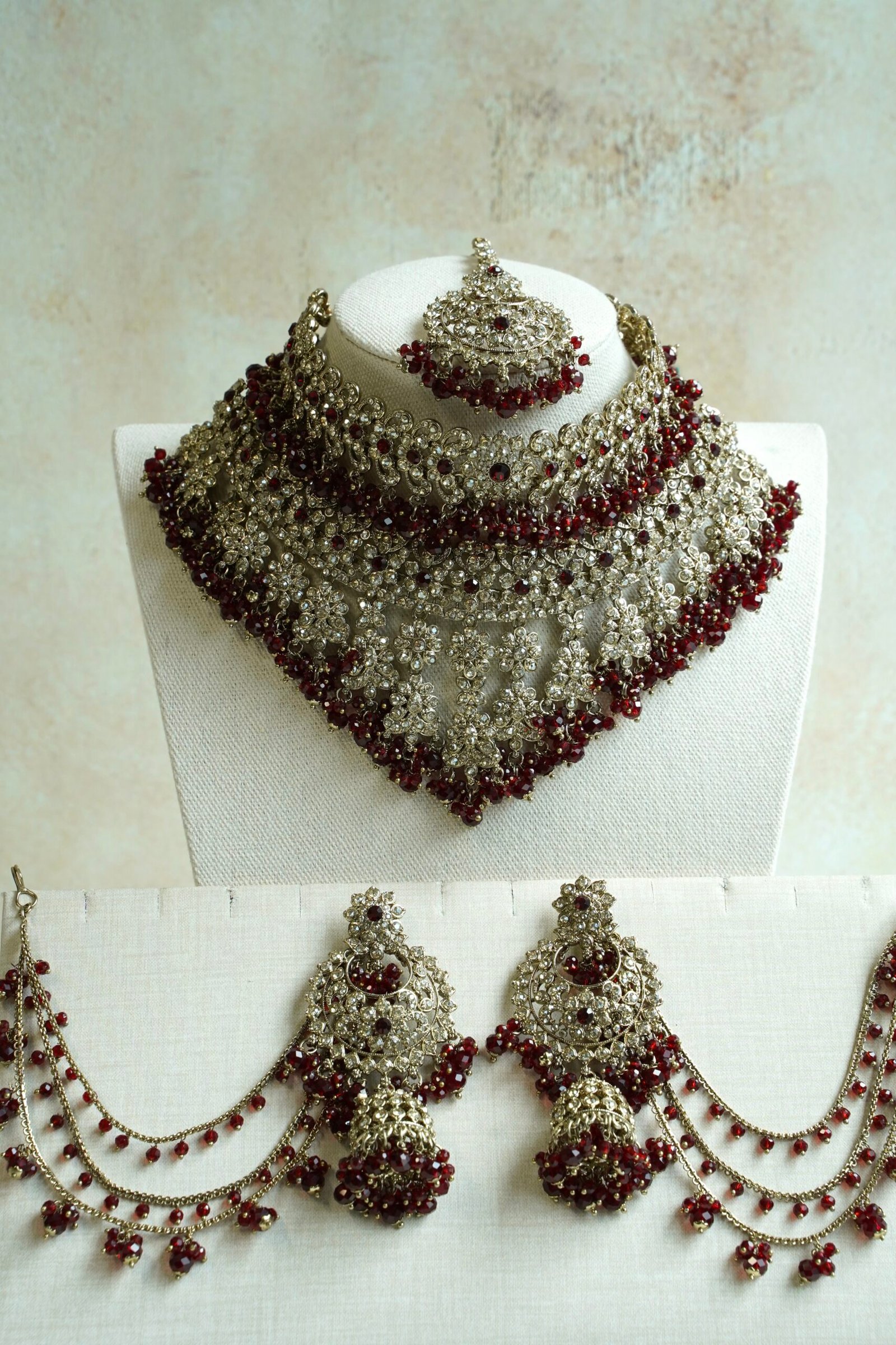 Ayesha crystal beaded bridal set in maroon with double layer necklace, jhumar, kaanchain, and tikka, South Asian wedding jewelry