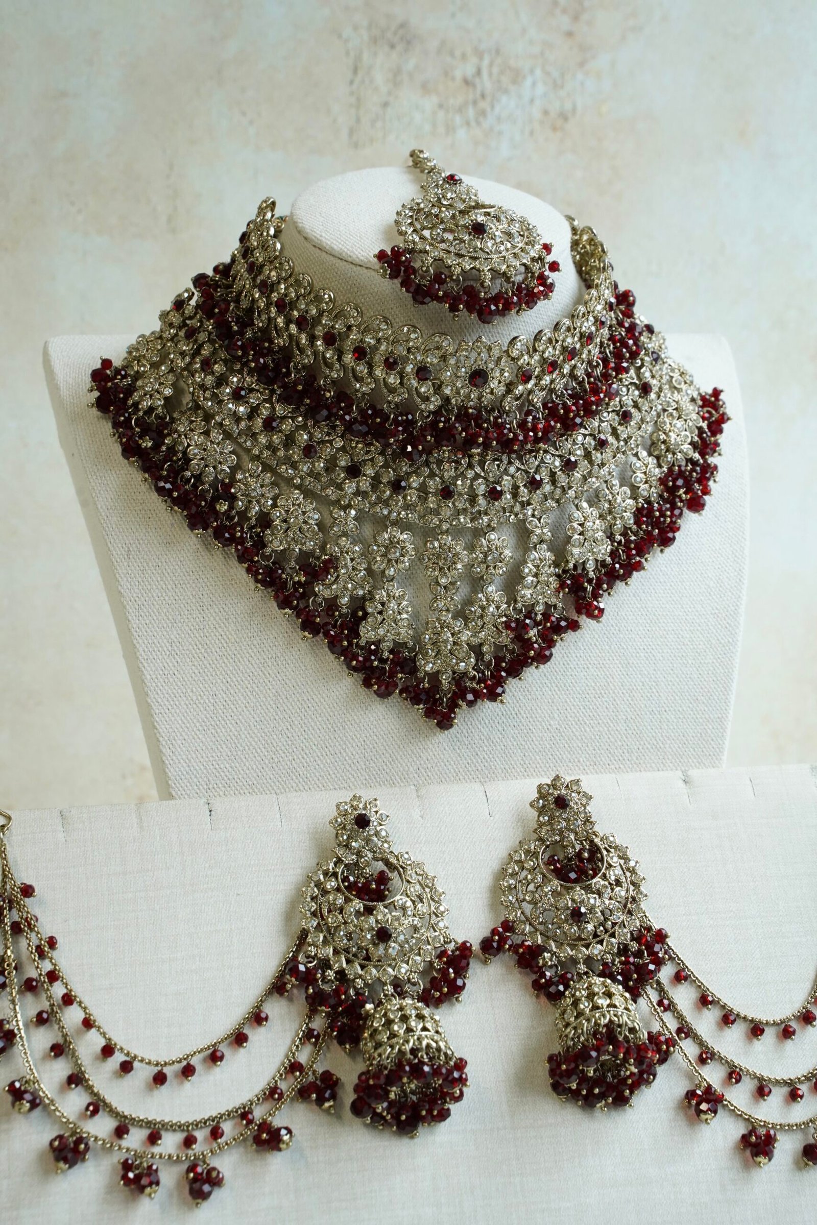 Ayesha crystal beaded bridal set in maroon with double layer necklace, jhumar, kaanchain, and tikka, South Asian wedding jewelry