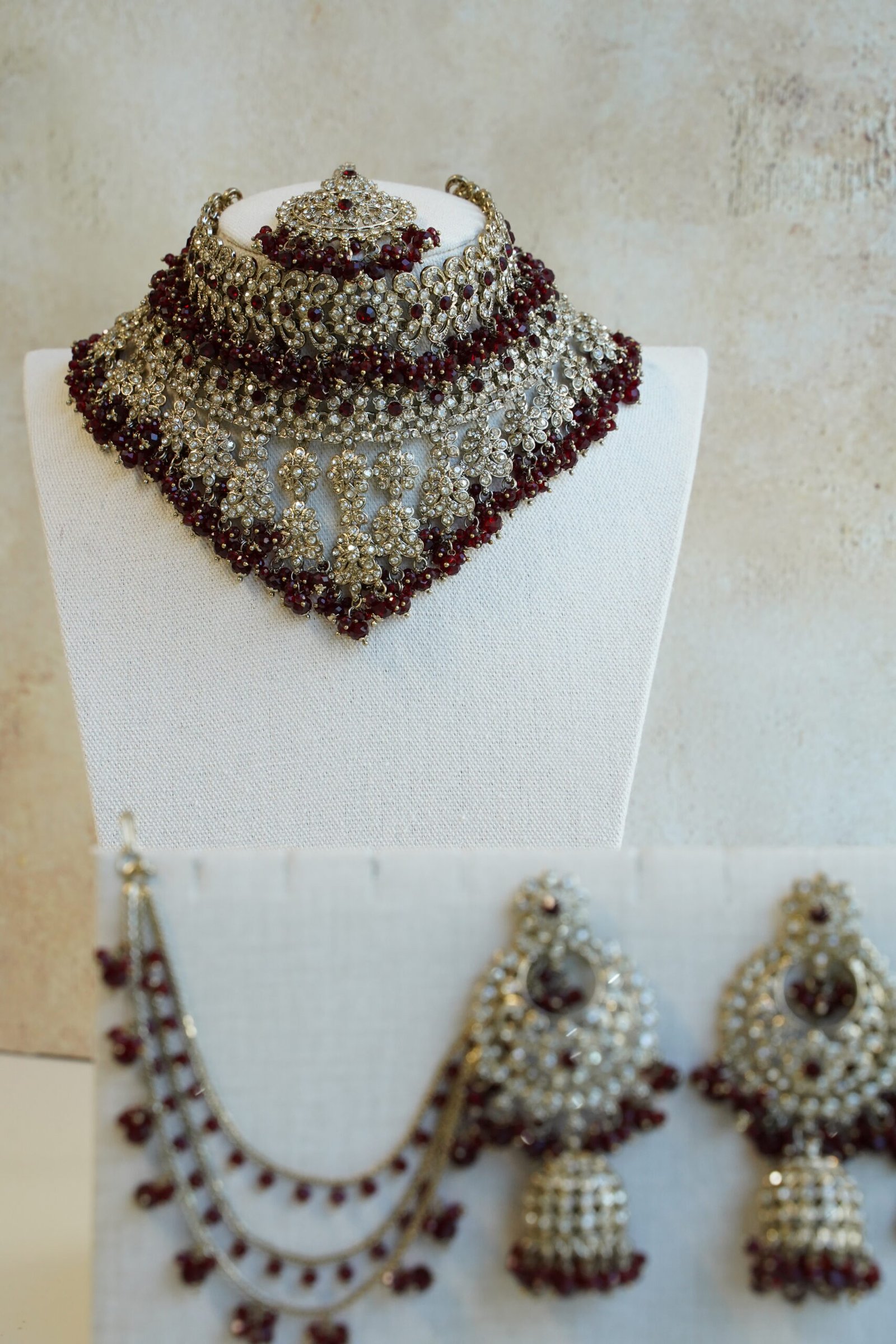 Ayesha crystal beaded bridal set in maroon with double layer necklace, jhumar, kaanchain, and tikka, South Asian wedding jewelry