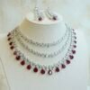 Luxe AD layered necklace set with maroon and clear stone detailing, South Asian bridal jewelry