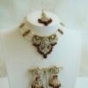 Riya artificial kundan necklace set in maroon with matching jhumka earrings and tikka, South Asian festive jewelry