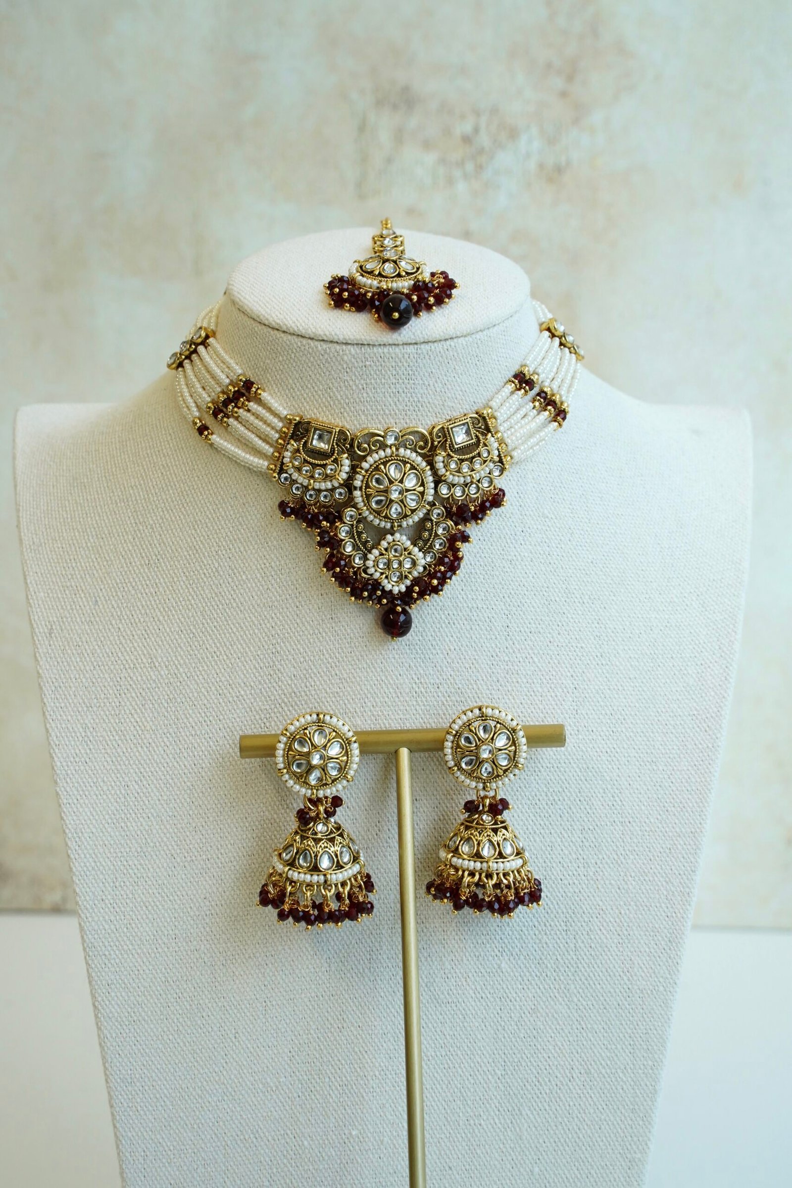 Riya artificial kundan necklace set in maroon with matching jhumka earrings and tikka, South Asian festive jewelry