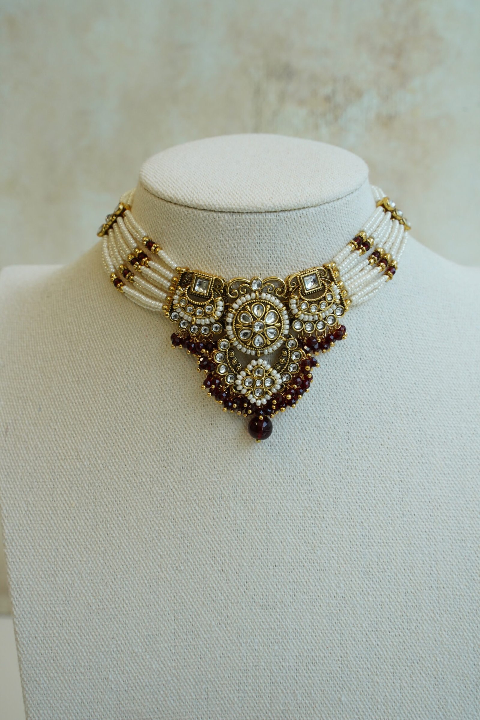 Riya artificial kundan necklace set in maroon with matching jhumka earrings and tikka, South Asian festive jewelry