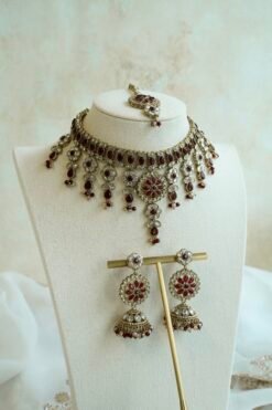 Samaira waterfall necklace set with maroon stones, matching jhumka earrings and tikka, South Asian festive jewelry