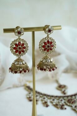 Samaira waterfall necklace set with maroon stones, matching jhumka earrings and tikka, South Asian festive jewelry
