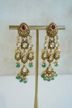 Slim kundan chandelier earrings in pink and green with pearl accents, South Asian festive jewelry