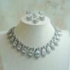 Sophie AD necklace set in silver finish with matching earrings and tikka, South Asian festive jewelry