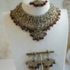 Maroon and antique champagne Arisha necklace set with matching earrings and maang tikka