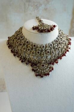 Maroon and antique champagne Arisha necklace set with matching earrings and maang tikka