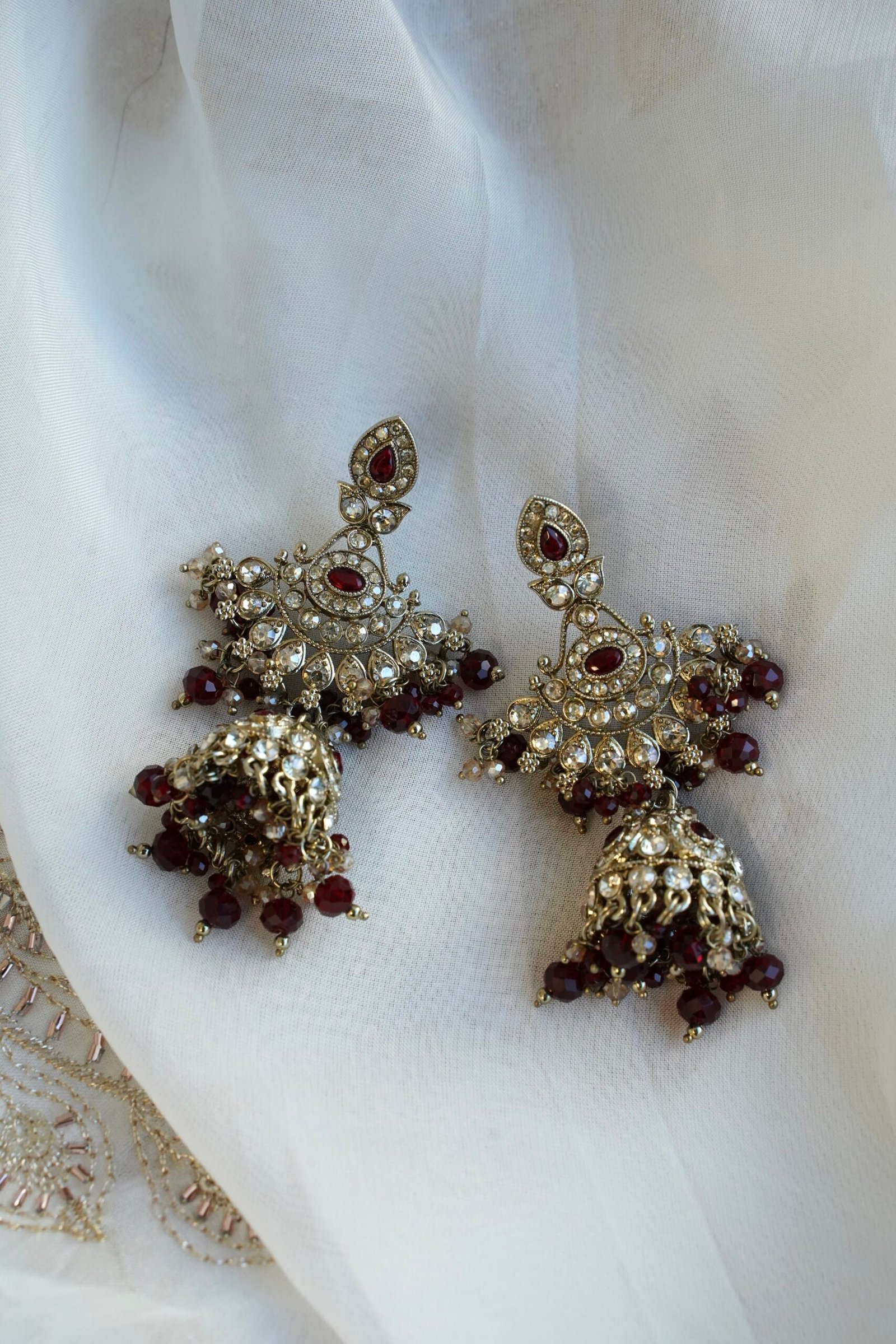Maroon and antique champagne Arisha necklace set with matching earrings and maang tikka