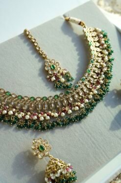 Heer Emerald Pink Necklace Set - antique gold necklace with emerald and pink stones, pearl bead drops, jhumka earrings, and tikka