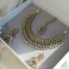 Antique gold Heer necklace set with pastel mint and pink stones, pearl and crystal drops