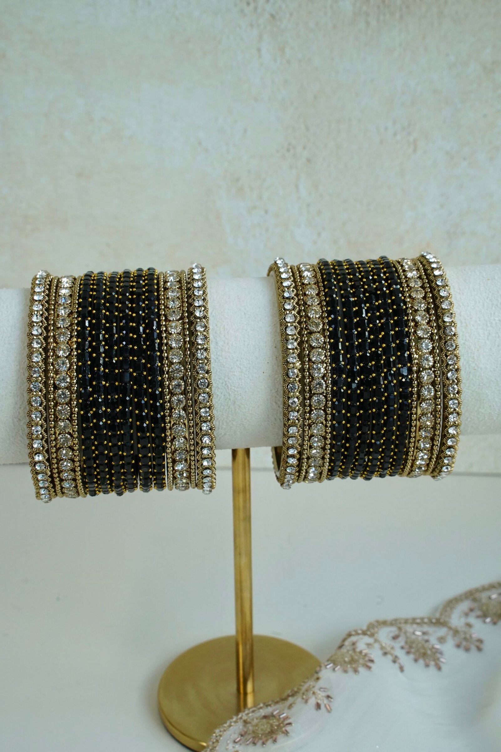 Black Glass bangle set with stone bands and antique gold-toned edging