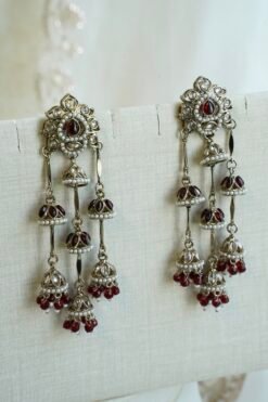 Maroon antique gold layered jhumka drop earrings with pearl detailing