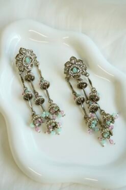 Layered Jhumka Drop Earrings in mint and pink - antique gold-toned tiered jhumka earrings with pearl trim and kundan-style tops