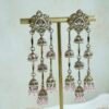 Layered Jhumka Drop Earrings in pink with pearl detailing and antique gold-toned finish
