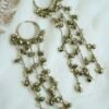 Long Kashmiri earrings with pearl beading and silver-toned bell charms