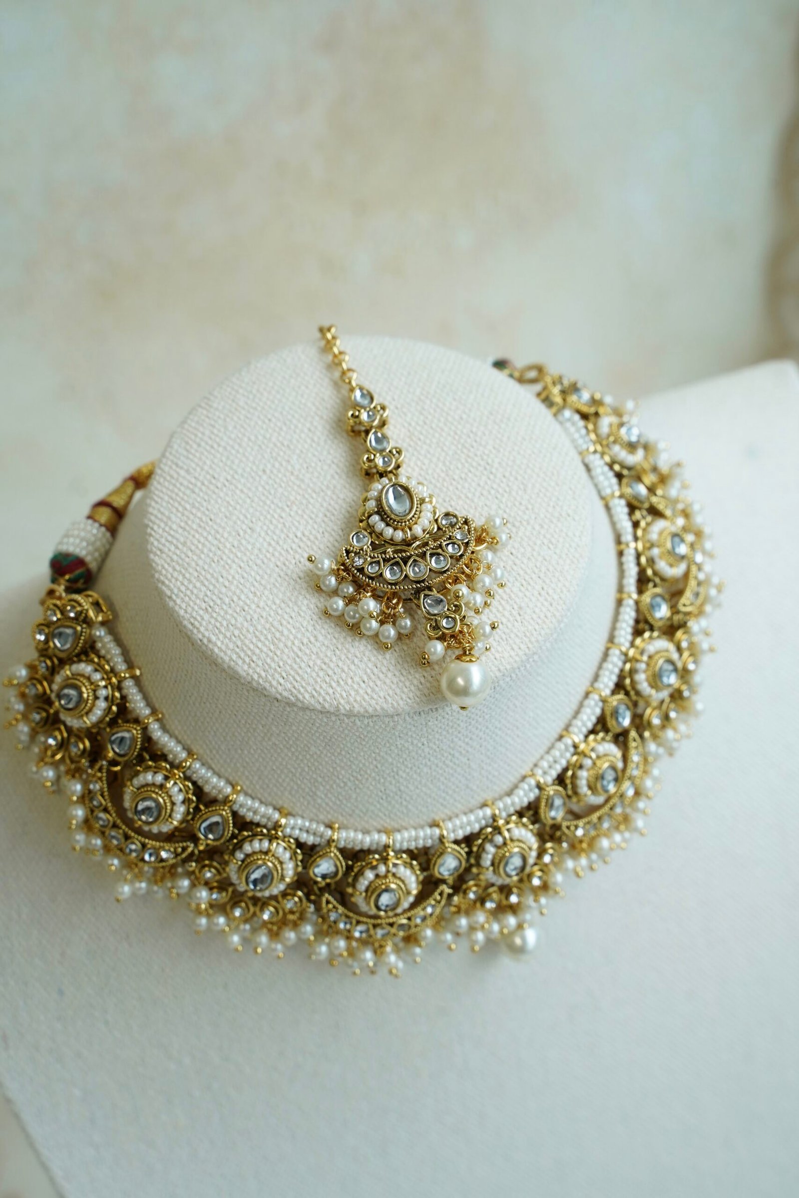 Mahnoor artificial kundan bridal set with choker necklace, jhumka earrings, and tikka