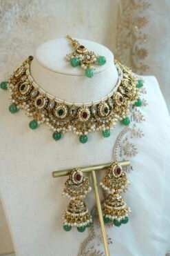 Mahnoor ruby and green artificial kundan jewelry set with choker necklace, jhumka earrings, and tikka