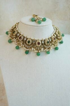 Mahnoor ruby and green artificial kundan jewelry set with choker necklace, jhumka earrings, and tikka