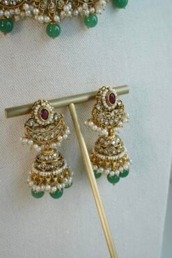 Mahnoor ruby and green artificial kundan jewelry set with choker necklace, jhumka earrings, and tikka