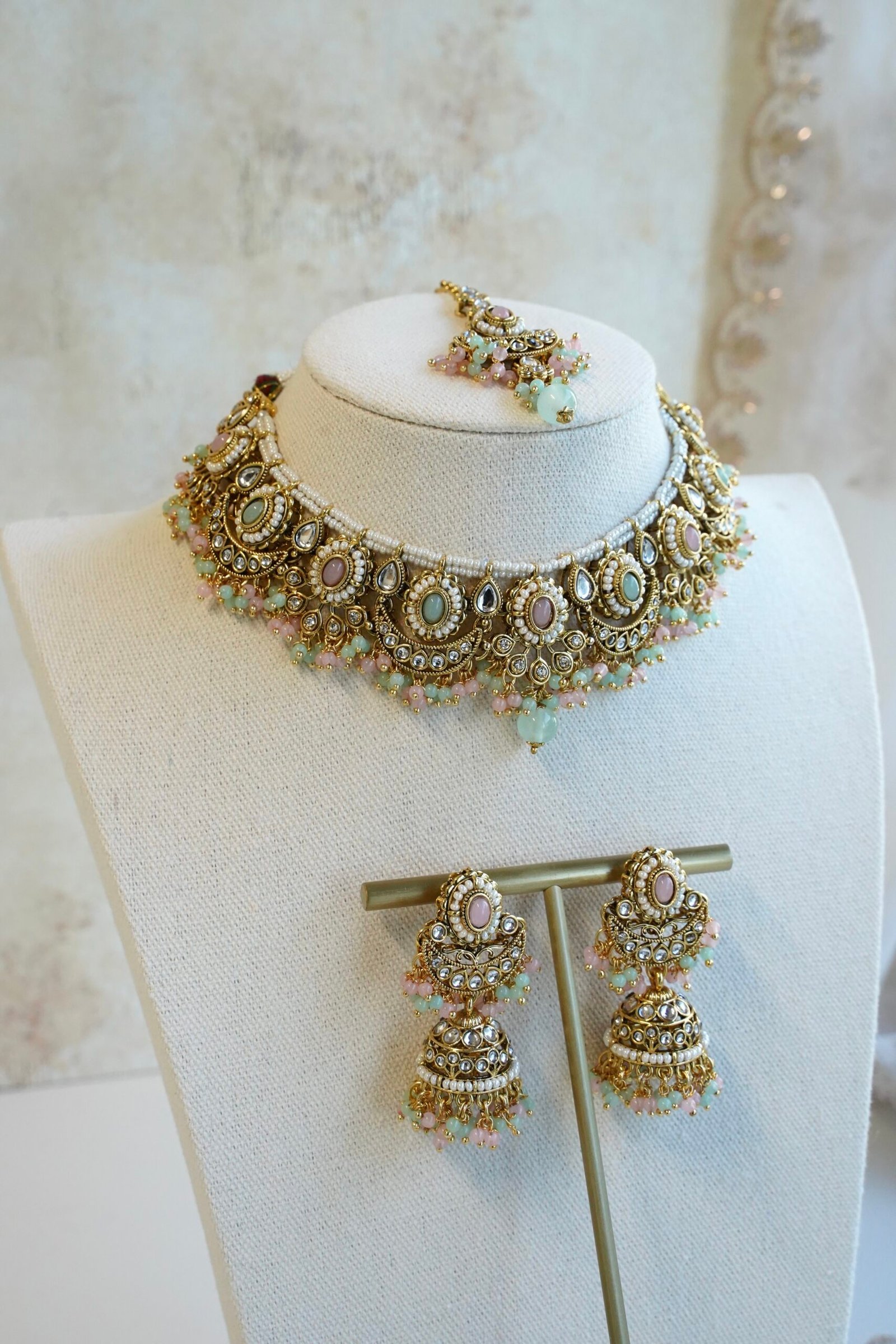 Pastel pink and mint Mahnoor kundan necklace set with jhumka earrings and tikka