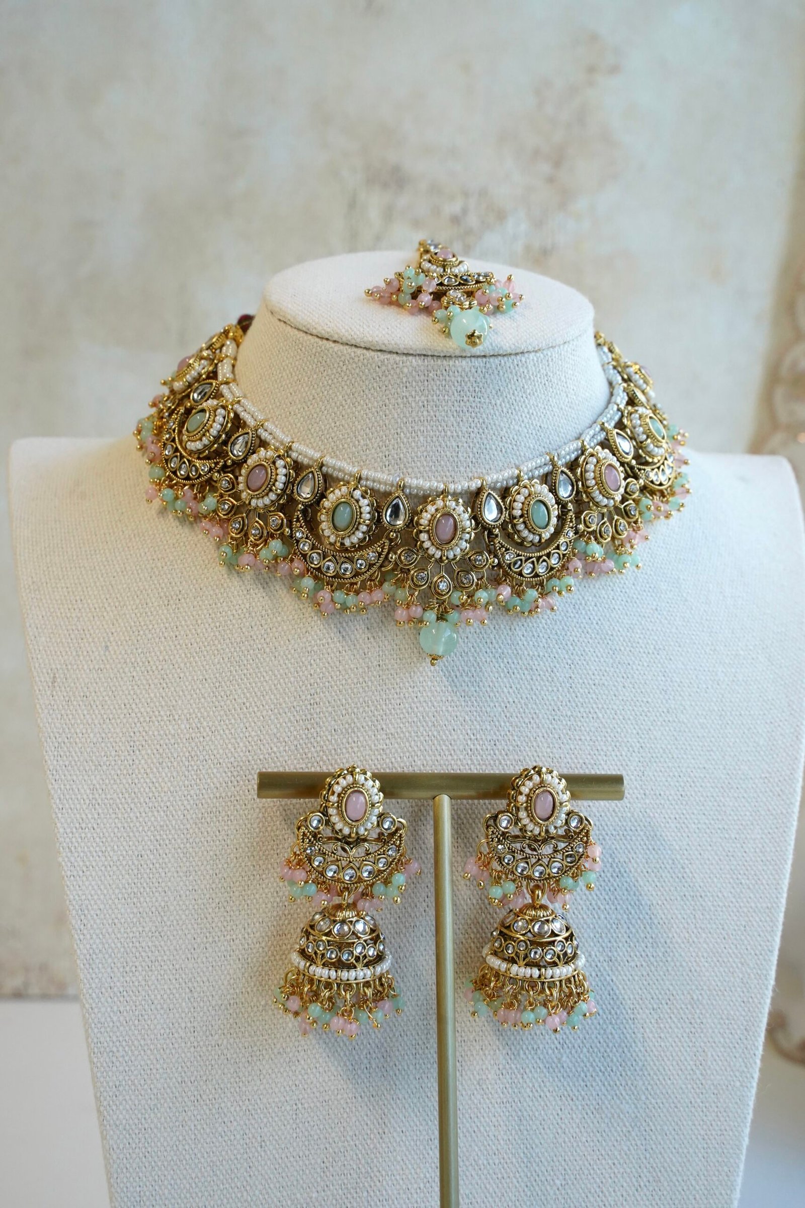Pastel pink and mint Mahnoor kundan necklace set with jhumka earrings and tikka