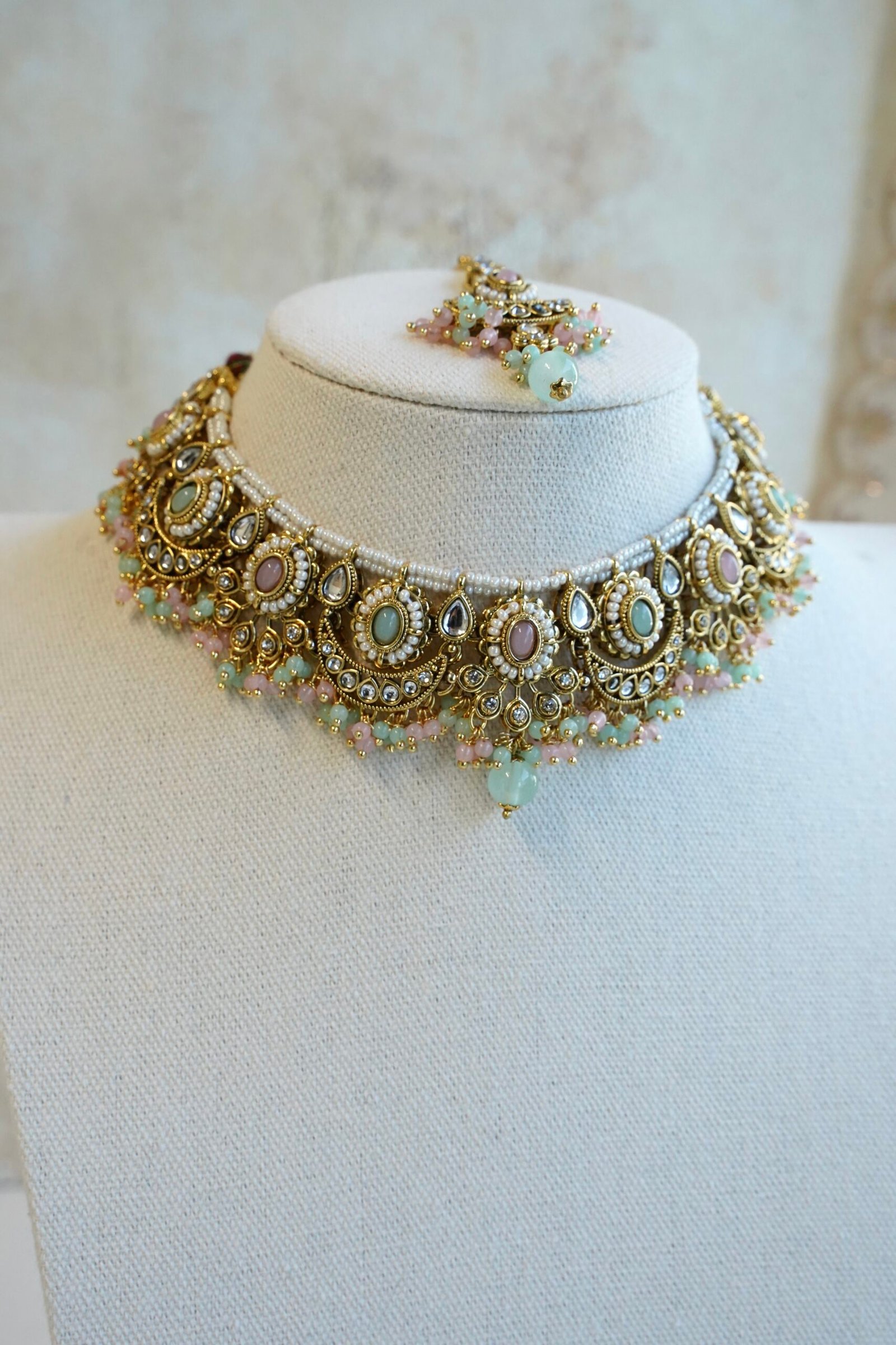 Pastel pink and mint Mahnoor kundan necklace set with jhumka earrings and tikka