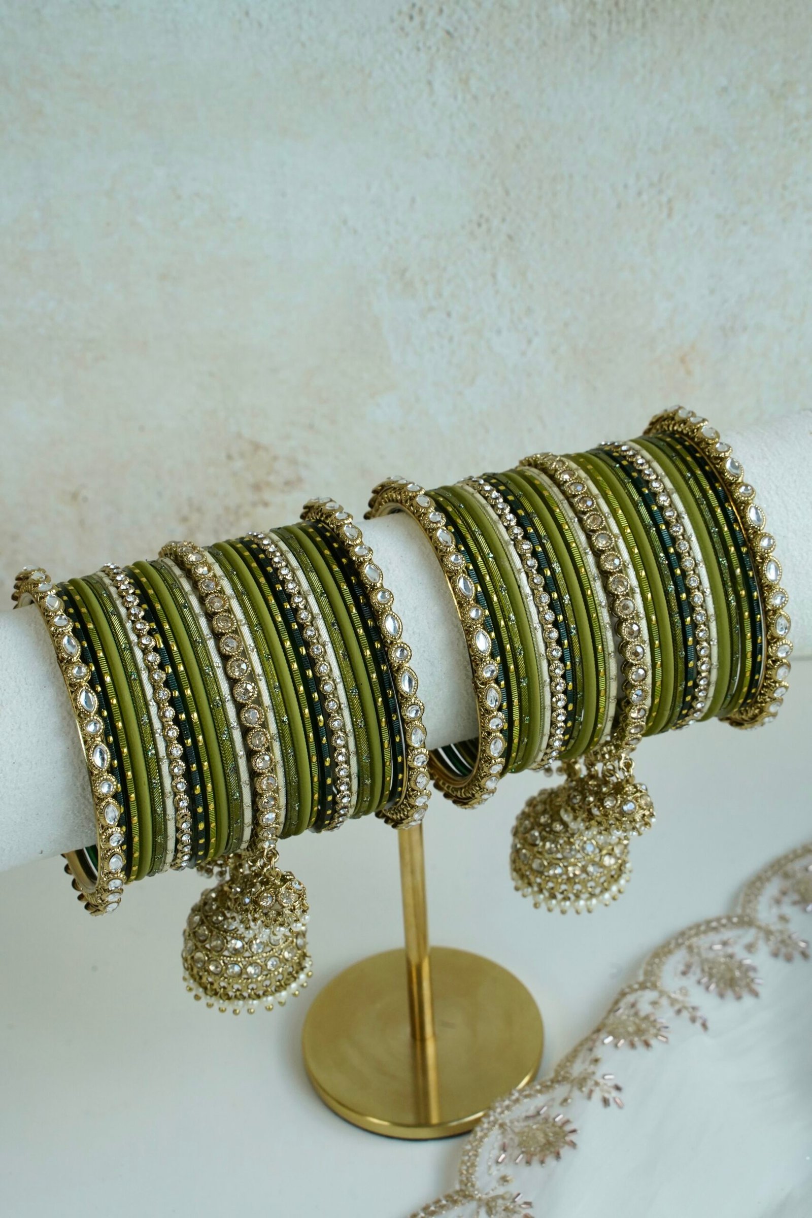 Mehndi Jhumka bangle set with olive green tones, stone bands, and dangling jhumka charm