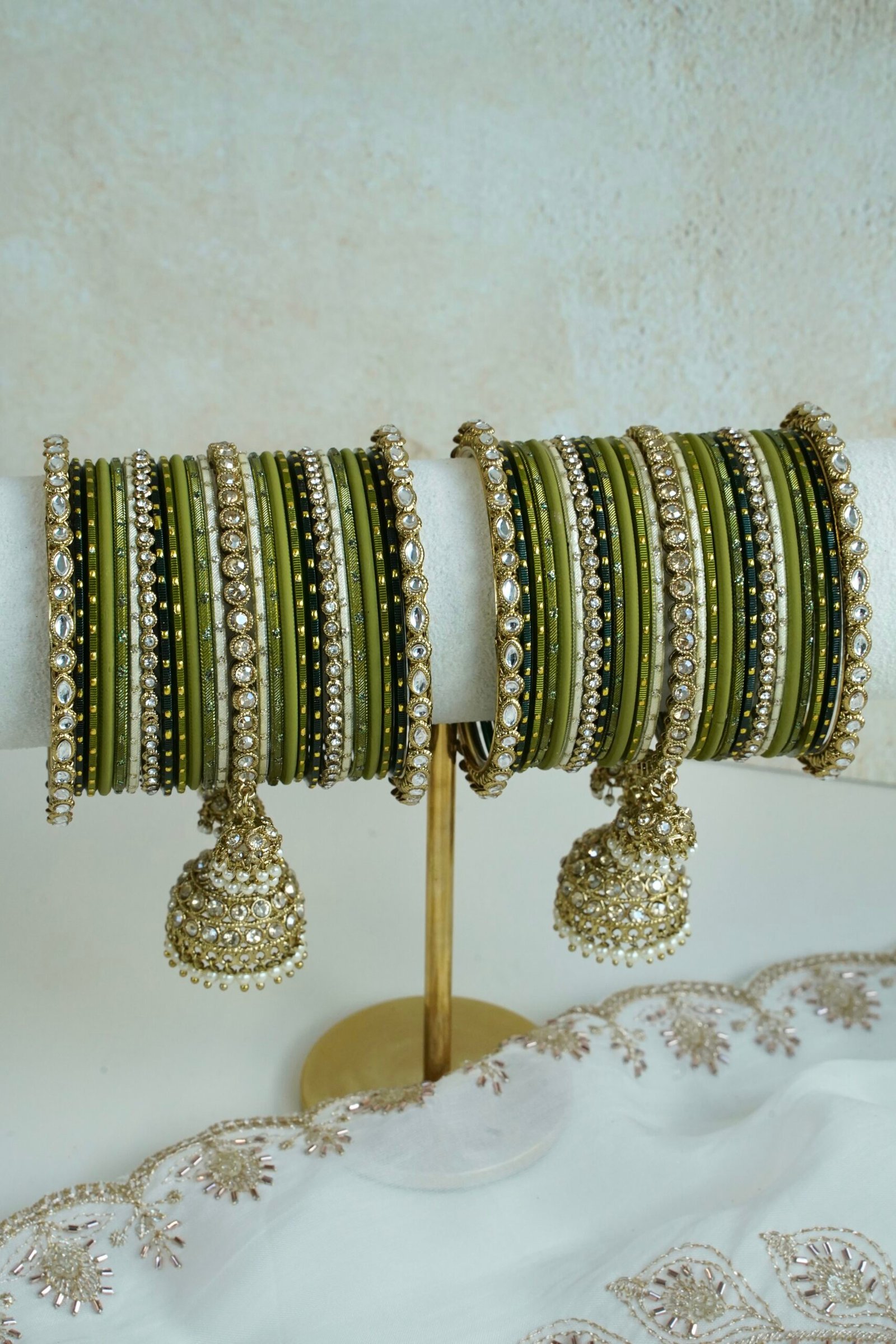 Mehndi Jhumka bangle set with olive green tones, stone bands, and dangling jhumka charm