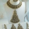 Champagne stone Nazneen bridal set with passa, earrings, nath, and mang tikka