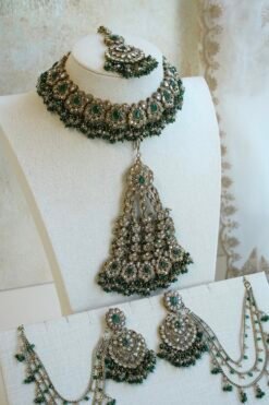 Champagne and green Nazneen bridal set with jhumar, earrings, nath, and tikka