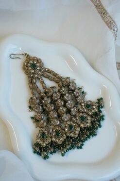 Champagne and green Nazneen bridal set with jhumar, earrings, nath, and tikka