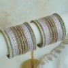 Pastel and Pearl bangle set with lilac, pink, and ivory tones, stone bands, and pearl trim