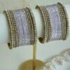 Slim Pastel bangle set with stone bands and antique gold-toned trim, available in lilac, mint, pink, and ivory