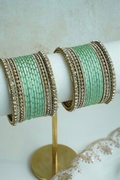 Slim Pastel bangle set with stone bands and antique gold-toned trim, available in lilac, mint, pink, and ivory