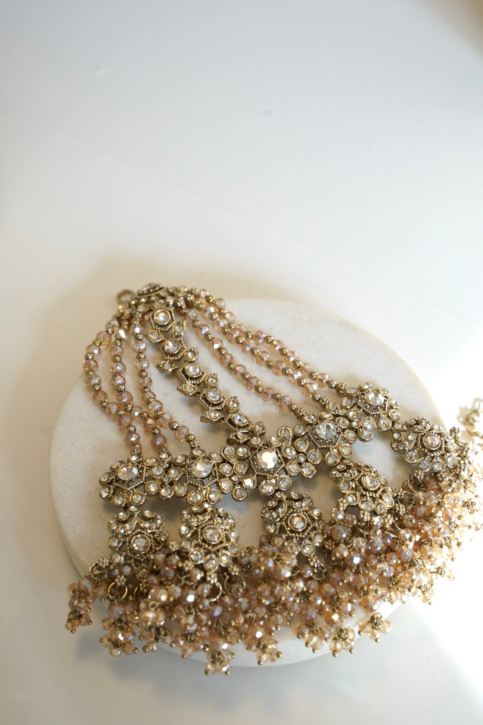 Yalina crystal bridal necklace set with double layer necklace, jhumar, and tikka