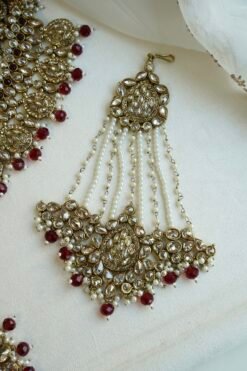 Zeenat Maroon Bridal Set - antique gold kundan bridal jewelry set with layered choker necklace, jhumar, jhumka earrings, and tikka