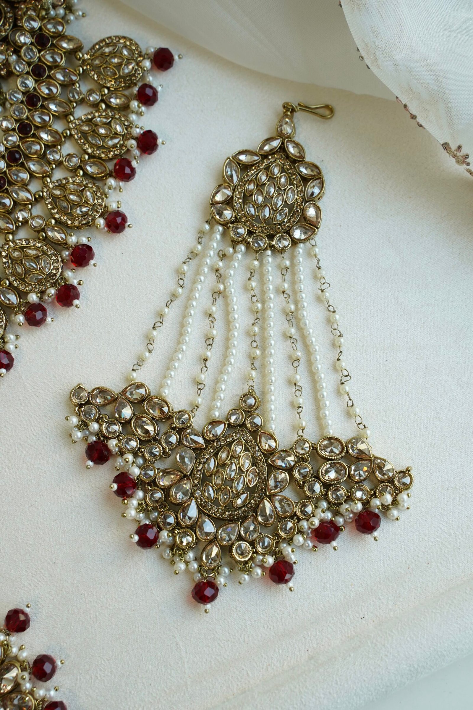 Zeenat Maroon Bridal Set - antique gold kundan bridal jewelry set with layered choker necklace, jhumar, jhumka earrings, and tikka