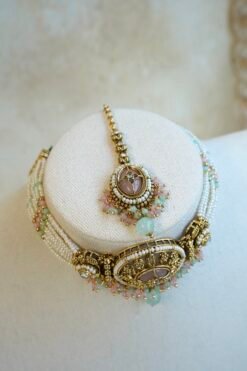 Aaliyah pastel antique gold choker set with pearl beaded band, jhumka earrings, and tikka