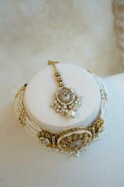Aaliyah antique gold kundan choker set with pearl beaded band, jhumka earrings, and tikka