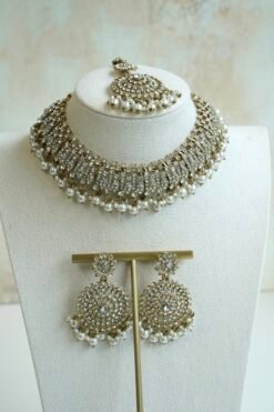 Alaya white zircon necklace set with beaded drops, earrings, and tikka in antique gold tone