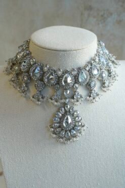 Amyra silver choker necklace set with clear stones, pendant drop, tikka, and jhumka earrings