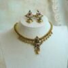 Padmini ruby green necklace set in antique gold tone with adjustable necklace and matching earrings