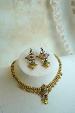 Padmini ruby green necklace set in antique gold tone with adjustable necklace and matching earrings